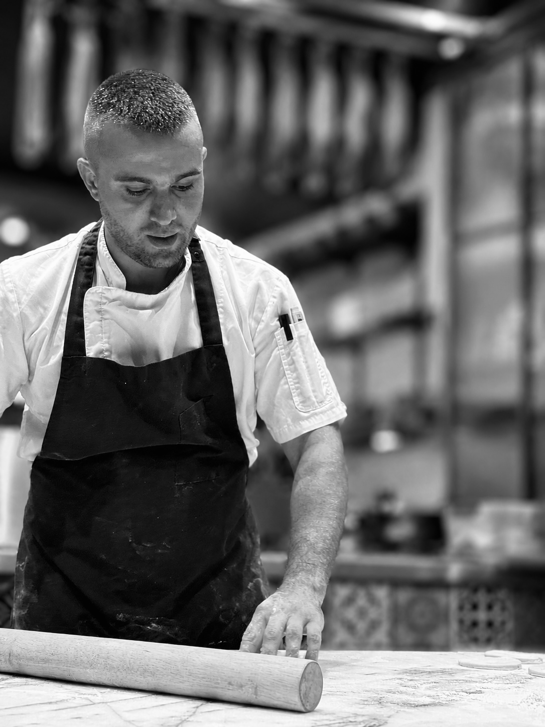 Chef Paata rolling dough by hand