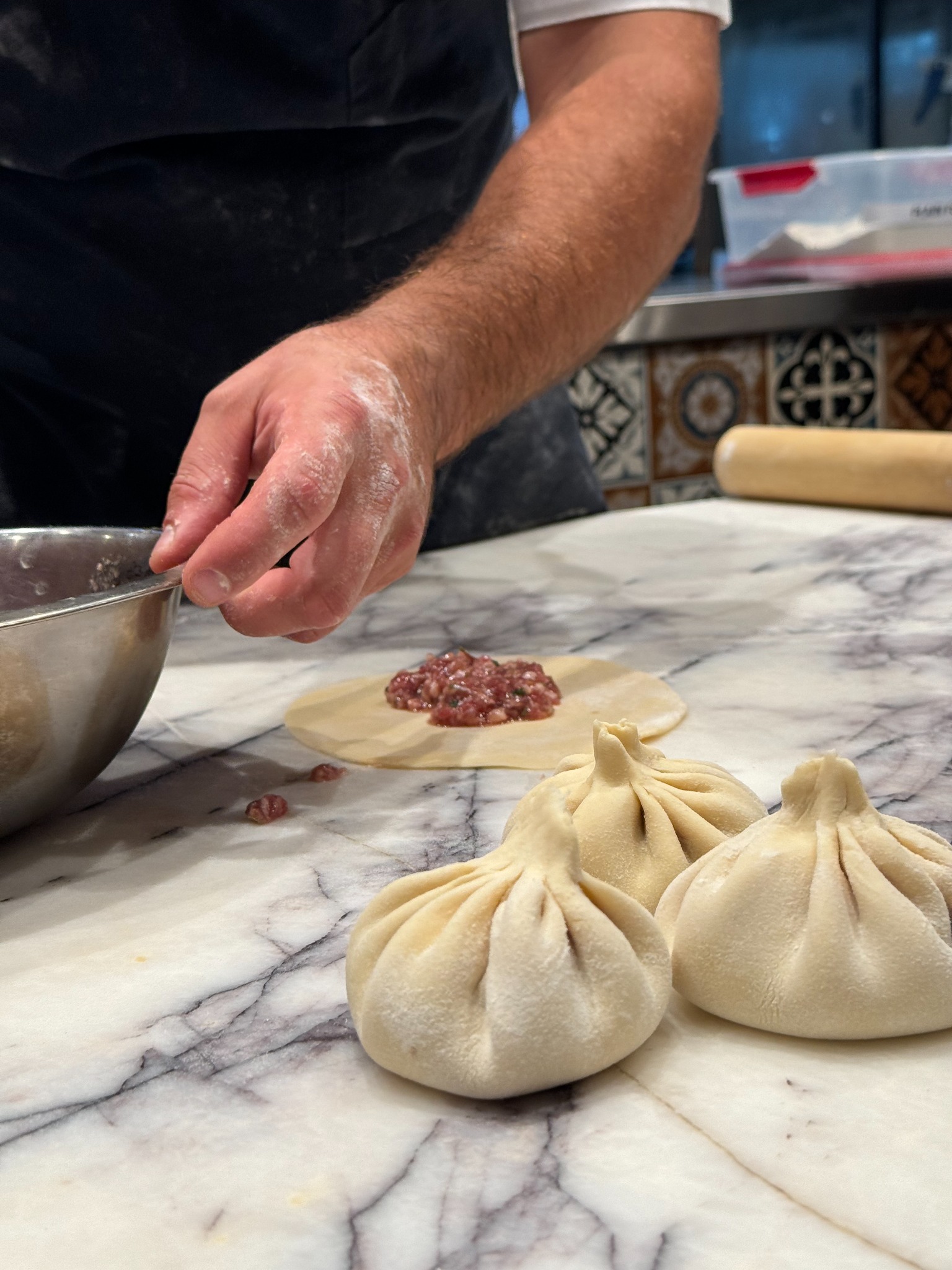 Hand-folding Georgian khinkali