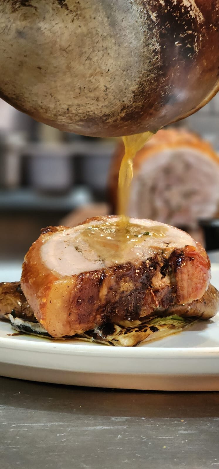 Roasted porchetta finished with pan juices