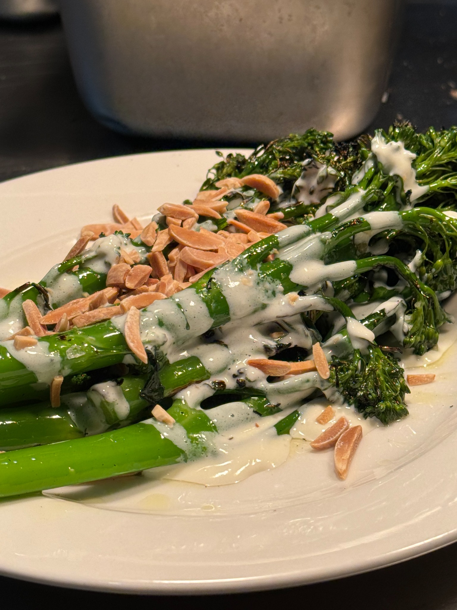 Charred broccolini with creamy dressing and toasted almonds